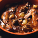 Le Coq au Vin de Cahors Mijoté aux Cèpes